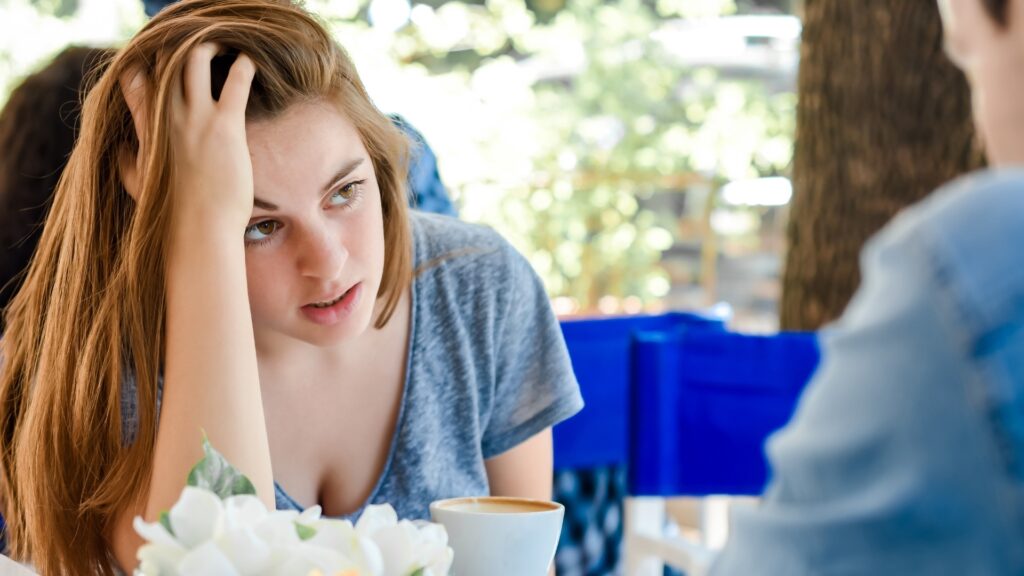 lady looking confused as her long distance partner makes their date boring