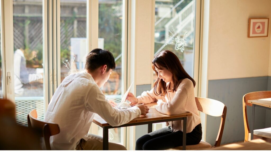young long distance couple discussing about moving together