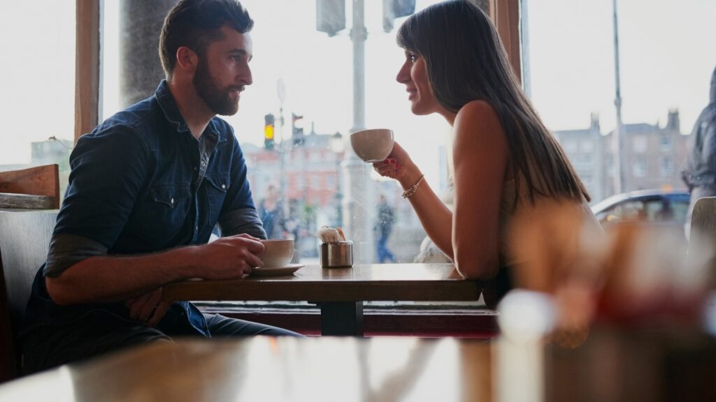 couple conversing over lunch