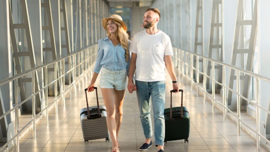 couple walking down the airport