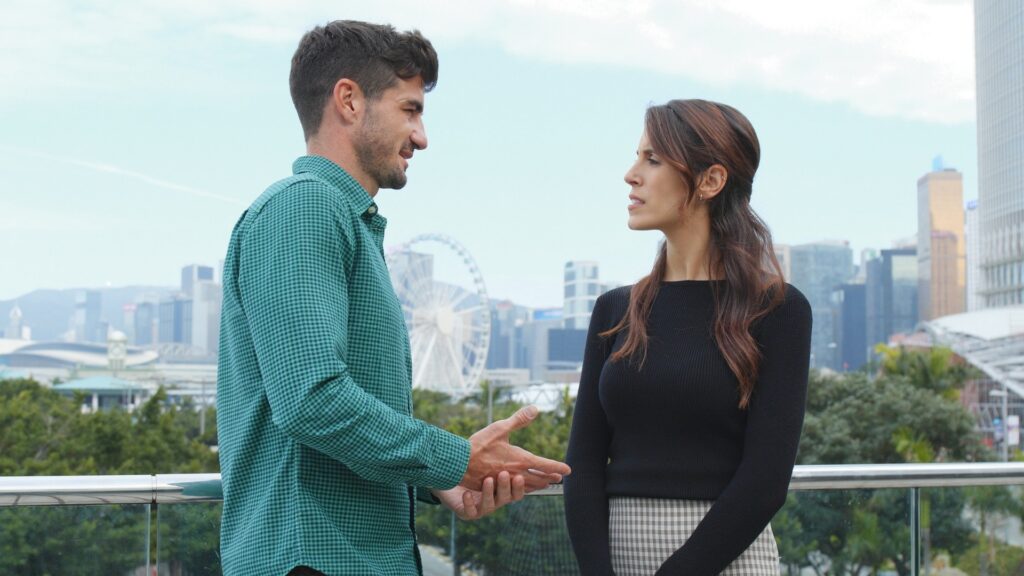 Man trying to explain to is woman wat e meant
