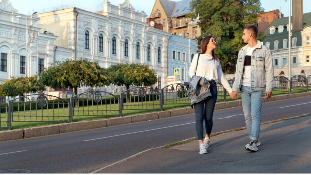 young long distance couple taking a walk