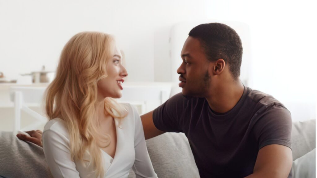couple talking to each other in their shared language
