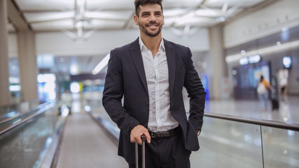 man on black suit traveling
