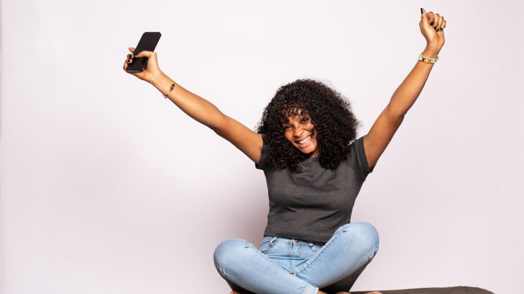 black lady happy about her personalized phone case