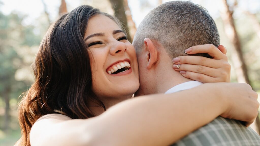 lady hugging her long distance partner