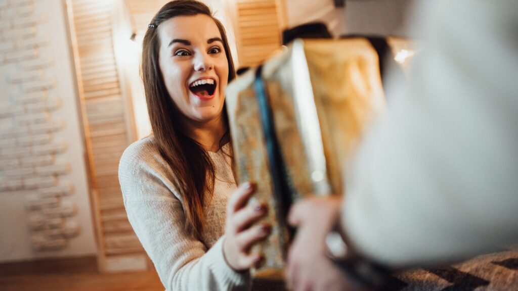 lady receiving a a personalized gift box