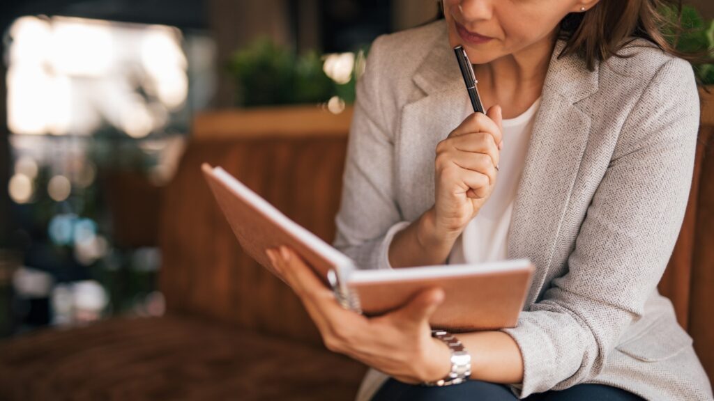 lady checking her records after she moved to be with her long distance partner