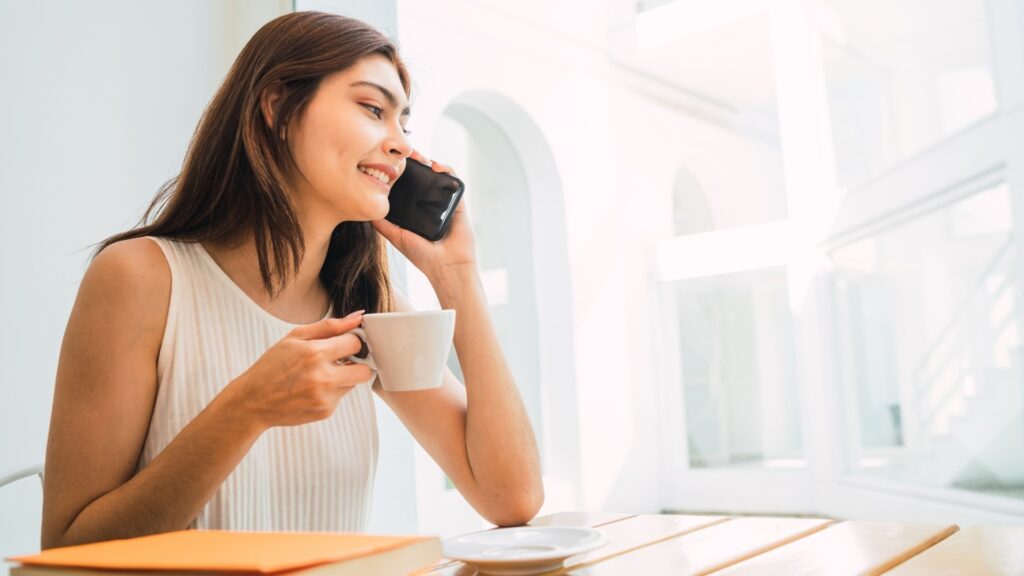 lady speaking over the phone with her man