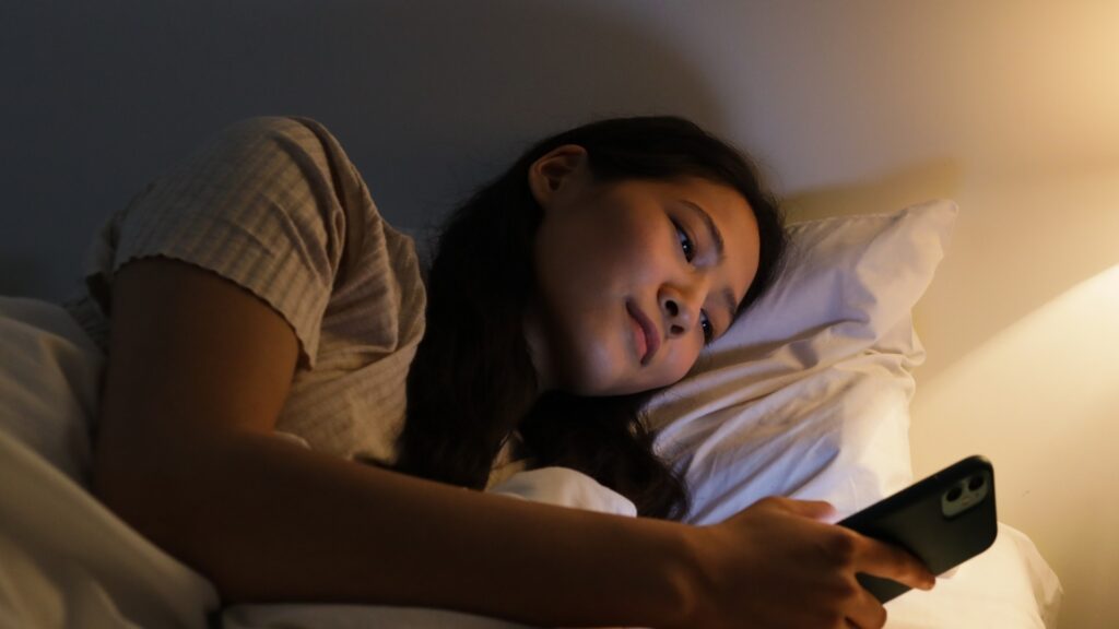 lady waiting for a response from her international long distance partner