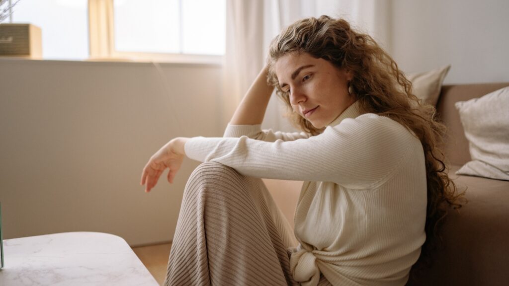 young lady feeling nervous about meeting her long distance partner