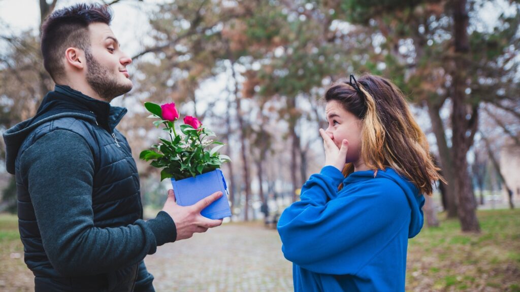 lady tearing up at the sight of the flowers her boyfriend sent her