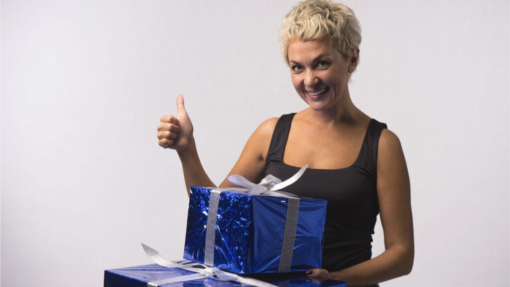 lady excited to receive a care package on what she mentioned earlier to her long-distance partner