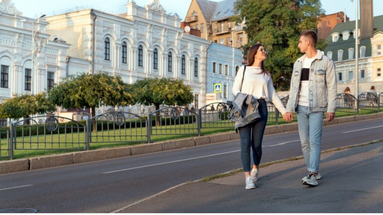 young long distance couple taking a walk
